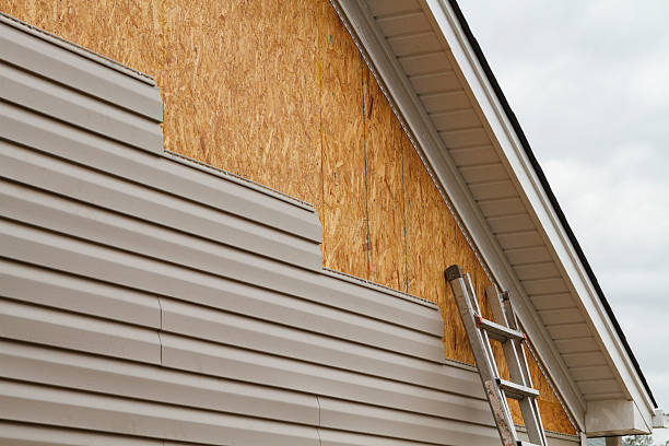 Professional Siding Installation technician working in Cassville, PA